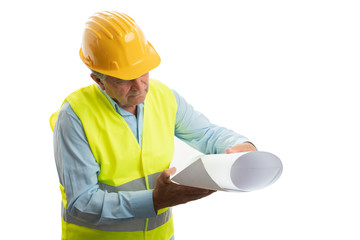 Architect looking at paper with plans