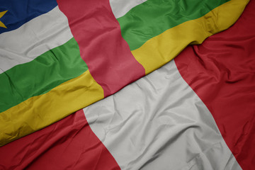 waving colorful flag of peru and national flag of central african republic.