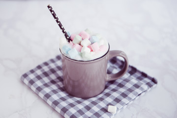 cup of coffee with milk and marshmallows