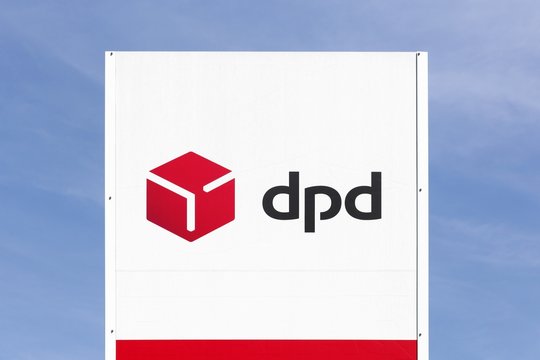 Trevoux, France - May 28, 2017: DPD logo on a panel. DPD is an international parcel delivery company owned by GeoPost. It has more than 830 depots in more than 40 countries