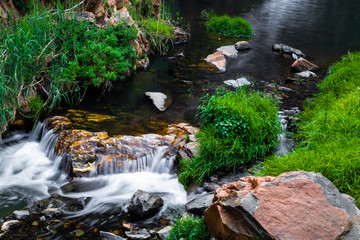 long exposure shot of a small stream at the Walter Sisulu Botanical gardens in south africa