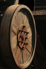 Side view close up of a wooden wheel decoratoin
