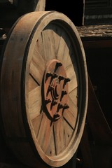 Fototapeta premium Side view close up of a wooden wheel decoratoin