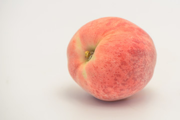 Beijing honey peach isolated on white background.