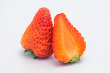 The still life photos of Big and beautiful red strawberries on white background.
