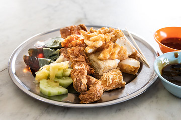 Variety of Penang Lobak, popular fried meat with chilli dips