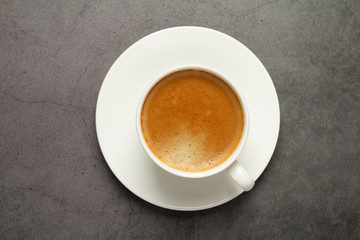 black coffee on a black background top view