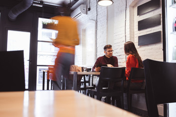 Waiter Takes Order From a young Couple