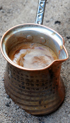 Turkish coffee in copper coffee pot