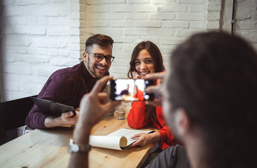 Young Friends Having at Fast Food Restaurant