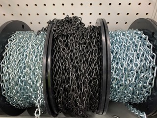 Spools of chain links at retail store
