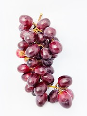 bunch of red grapes isolated on white