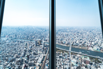 Fototapeta na wymiar Tokyo, Japan - Mar 27, 2019:Asia business concept for real estate and corporate construction - panoramic urban city skyline aerial view under sky in tokyo, Japan
