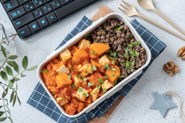 Tofu and sweet potato curry with lentils in lunch box