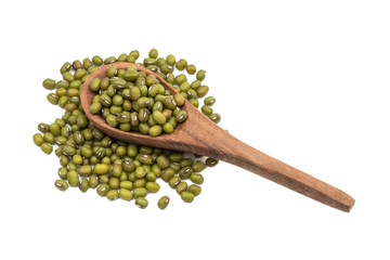 Brown wooden spoon with mung beans and spill around it seen obliquely from above and isolated on white background