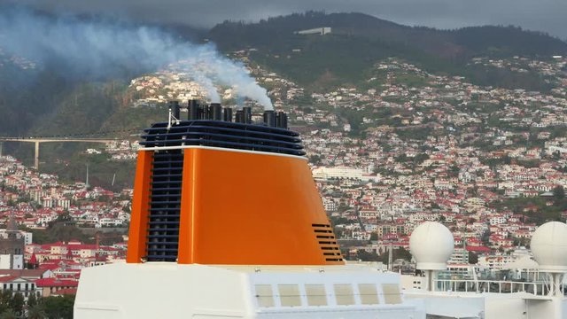 Air pollution from a cruise ship exhaust in front of Funchal, Madeira
