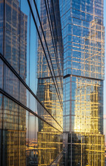 Fototapeta na wymiar Glass facades of modern skyscrapers