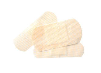 Medical sticking plasters isolated on white. First aid item