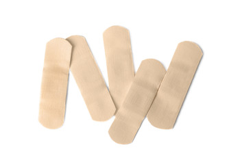 Medical sticking plasters isolated on white. First aid item