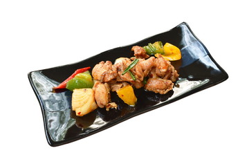 spicy fried crispy chicken with bell pepper on plate