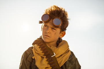 Post-apocalyptic Warrior Boy Outdoors in a Wasteland