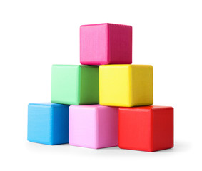 Many colorful wooden cubes isolated on white