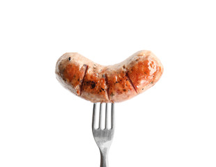 Fork with grilled sausage isolated on white
