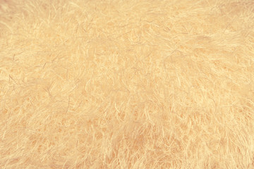 Abstract background of white fabric texture. Fragment of fluffy cloth.