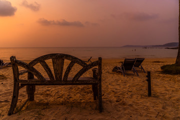 Fototapeta na wymiar wood bench in sand beach on The beach koh kood a sea thailand in the beautiful sunset time