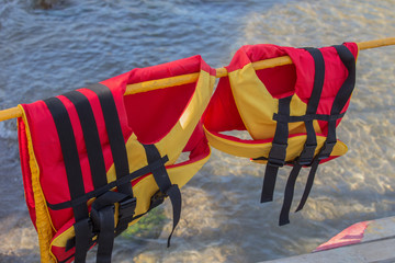 Life jackets on a pier guard