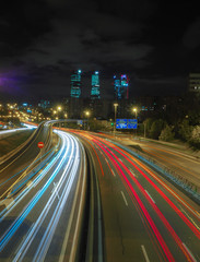 Obraz premium Night with traffic long exposure 4 towers of Madrid