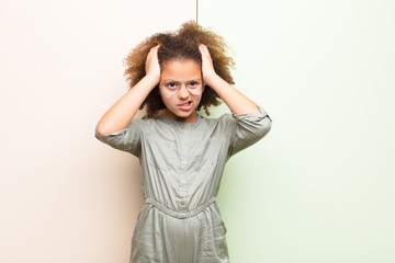 african american little girl feeling frustrated and annoyed, sick and tired of failure, fed-up with...