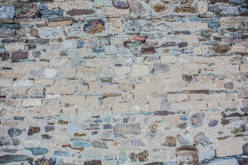 brick wall of rough stone background
