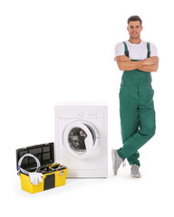 Repairman with toolbox near washing machine on white background