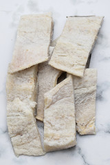 salted dry cod fish on gray backgrpound