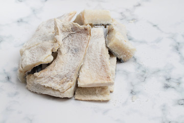salted dry cod fish on gray backgrpound