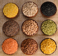Beans and barriers are plated in clay pot decorated with colourful vibe  