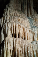 POSTOJNA, SLOVENIJA - JANUARY 28, 2020: Postojna cave -one of the biggest tourist attractions in Slovenia. 24 km long  cave system with stalactites and stalagmites.