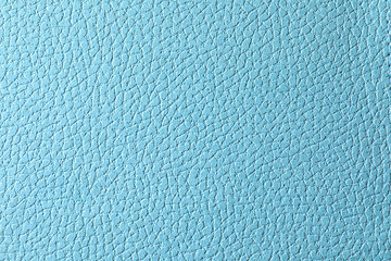 Texture of light blue leather as background, closeup