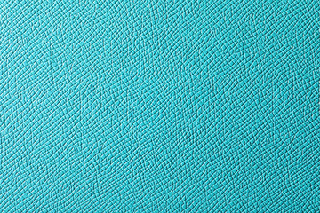 Texture of turquoise leather as background, closeup