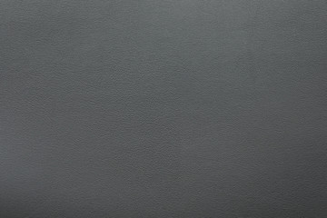 Texture of dark grey leather as background, closeup