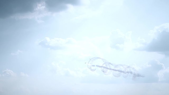 Three fighter jets in the blue sky. A general plan. Aerobatic figures. Airshow. 13 seconds