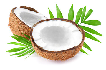 Coconut with green leaves isolated on white background