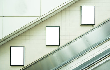 Blank billboard mock up on the wall in subway station. Advertising concept