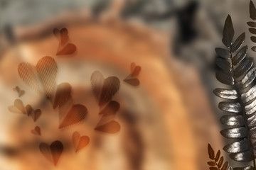 Wooden blurred background with the hearts of the substrate.
