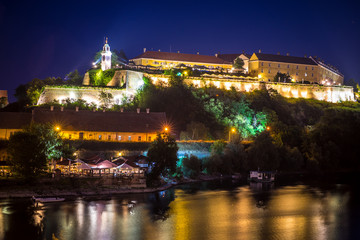 Fototapeta na wymiar Night view on Petrovaradin fortress over Danube river, Novi Sad, Serbia