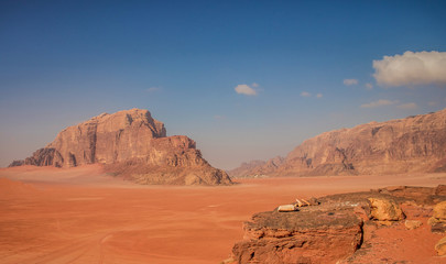 Fototapeta na wymiar picturesque top view nature landscape photography of Wadi Rum desert Middle East touristic heritage site with big sand valley and picturesque rocks