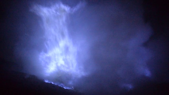 Blue fire in indonesia from sulfur volcano