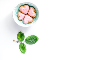 cookies for Valentine Day heartshaped white background top view pattern