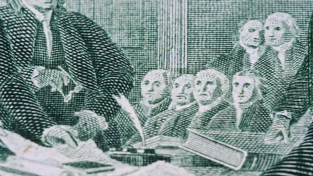 Sliding video of a two US dollar bill note, showing a reproduction of John Trumbull s Declaration of Independence